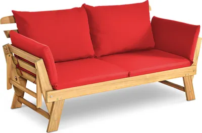 A wooden garden bench with red cushions, shown from a front-side angle on a white background.