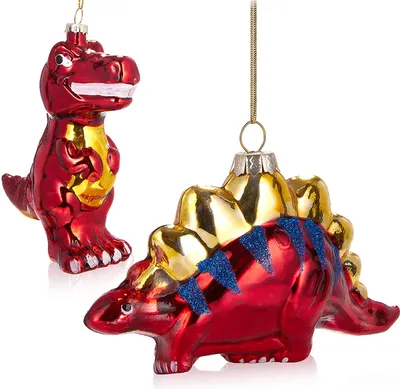 Two shiny, red and gold dinosaur Christmas ornaments hang against a white background.