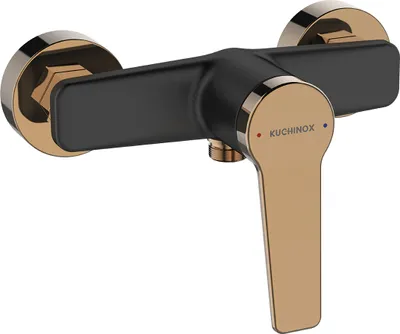 A black and rose gold shower faucet against a white background.