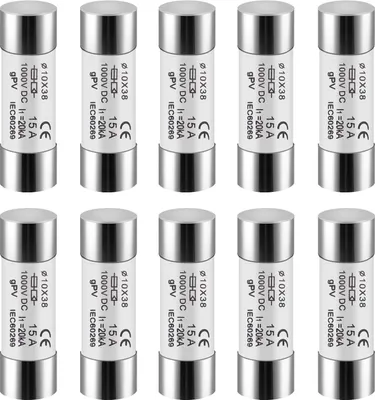 A collection of photovoltaic fuses arranged in two rows on a white background.