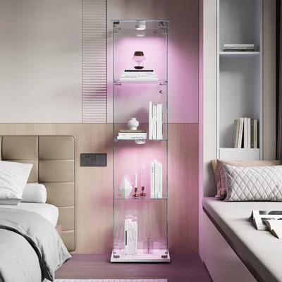A glass display cabinet with LED lighting in a bedroom setting.