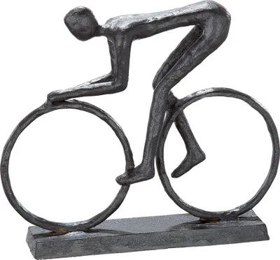 A sculpture of a cyclist in motion.