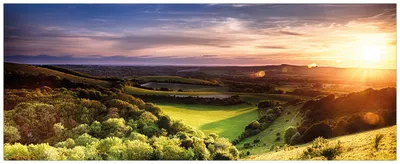 Produktbild von Wallario Premium Glasbild, freischwebende Optik, kräftige Farben, Größe 80 x 32 cm Motiv Farbenfroher Sonnenuntergang in England