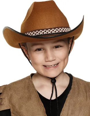 A young boy wearing a cowboy hat and vest.