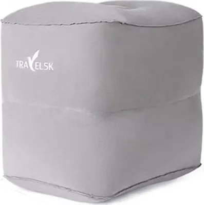 A gray inflatable footrest is shown against a light gray background.