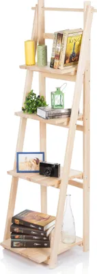 A wooden ladder shelf displaying various decorative items and books.