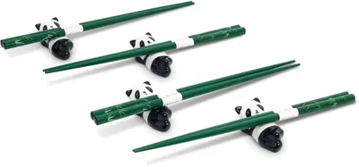 Four pairs of green chopsticks with panda-shaped ceramic rests, arranged diagonally on a white background.