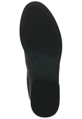 The image shows the sole of a black boot.