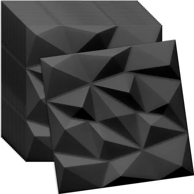 A stack of black 3D wall panels with a single panel in the foreground.