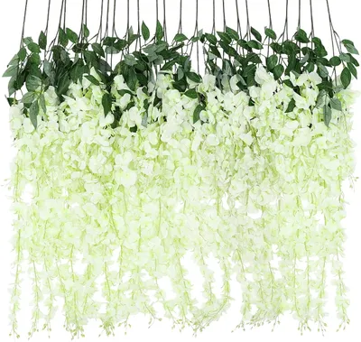 A display of multiple artificial wisteria flower garlands hanging down.