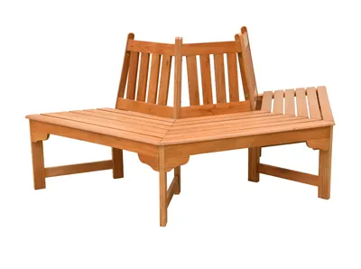 A wooden bench designed to surround a tree.