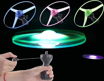 Produktbild von LED Leuchten Spinning Flying Disc Untertasse Pull String Kids Toy Party Supplies