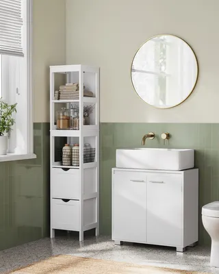 A modern bathroom with a white vanity, sink, and a tall white storage cabinet.
