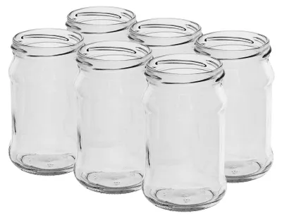 A group of empty glass jars.