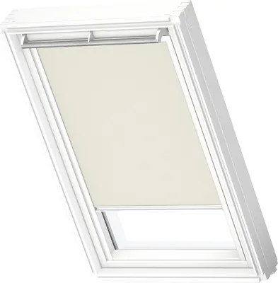 A VELUX skylight window with a beige roller blind partially lowered.