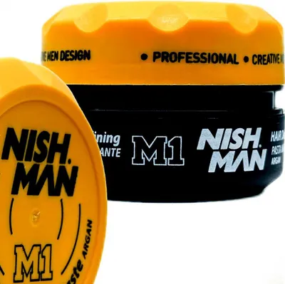 Two containers of Nishman M1 hair product are shown against a white background. One container is in the foreground and is yellow, while the other is in the background and is black with a yellow lid.