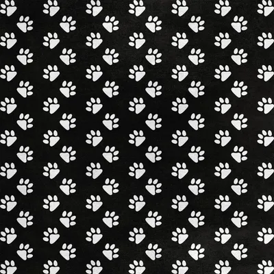 Productafbeelding van Koninklijke fluwelen stof, polyester, geschikt voor naaien - motief: pootafdrukken op zwarte achtergrond