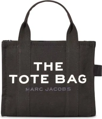 A black Marc Jacobs tote bag with white text.