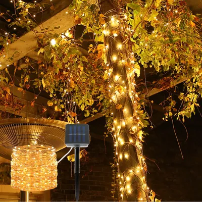 Produktbild von Solar Kupferdraht Lichterkette 22m, 200 warmweisse LEDs, IP44 – Perfekt für Garten, Balkon oder Terrasse