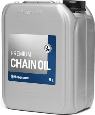 A silver plastic container of Husqvarna chain oil.