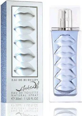 A product shot of a perfume bottle and its packaging, both featuring a distinctive lip design.