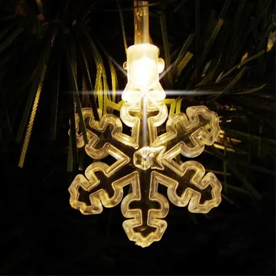 Image de 40 LED Flocon de neige Chaîne lumineuse blanc chaud Décoration hivernale Éclairage de Noël