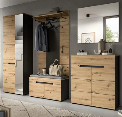 A modern entryway with a wardrobe set, mirror, and chest of drawers.