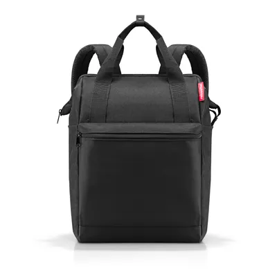 A black backpack on a white background.