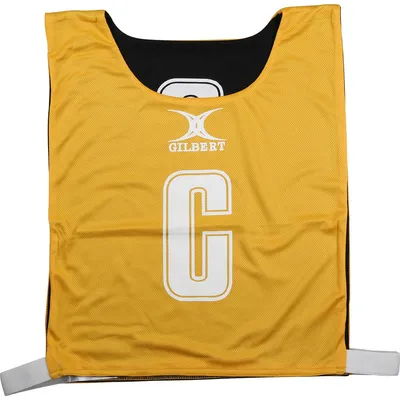 Imagen del producto de Chaleco de netball Gilbert Weste, reversible, talla grande, color ámbar y , confeccionado en poliéster