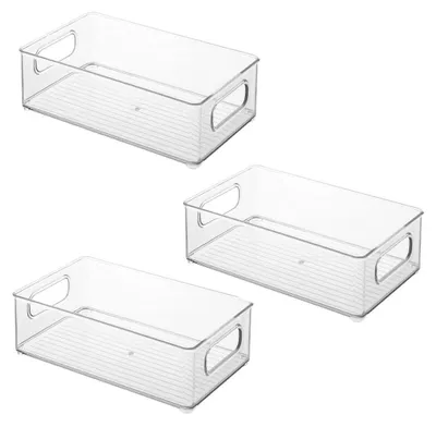 Three clear plastic storage bins are arranged in a stacked formation against a white background.