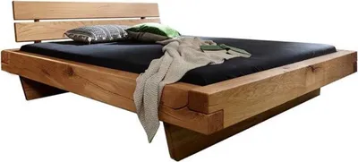 Produktbild von Casa Padrino Luxus Doppelbett Naturfarben - Verschiedene Größen - Massivholz Bett mit Kopfteil und Matratze - Hotel Möbel - Schlafzimmer Möbel - Luxus Einrichtung - Luxus Möbel