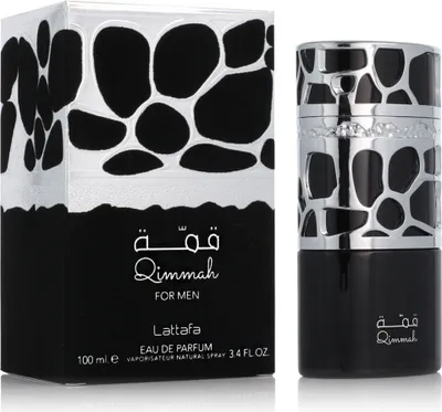 A product shot of a perfume bottle and its box, presented side-by-side on a white background.