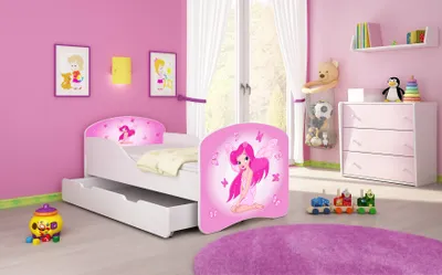 A child's bedroom with a pink theme, featuring a bed, dresser, and toys.