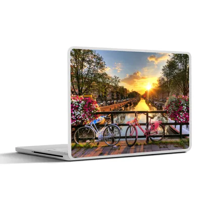 Produktbild von MuchoWow® Laptop Aufkleber Sticker Cover Amsterdam - Blumen - Brücke - Fahrrad - Sonnenuntergang 31x22.5 cm - Laptop-Deko