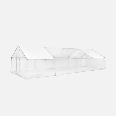 A long, white greenhouse structure with a green trim, set against a plain white background.