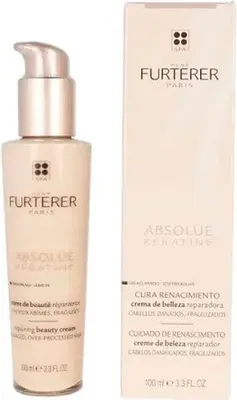 A product shot of a bottle and its packaging.
