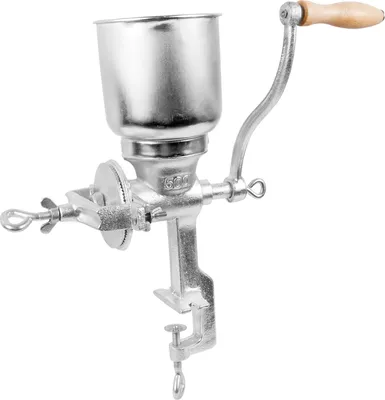 A manual grain mill with a clamp for attaching to a surface.