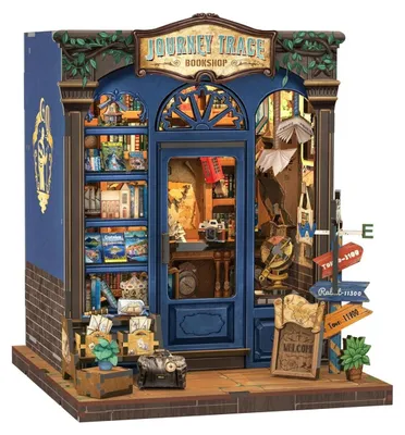 A miniature model of a bookshop called 'Journey Trace Bookshop'.