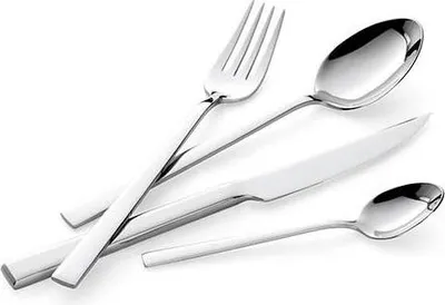 A set of silverware, including a fork, a large spoon, a knife, and a small spoon, arranged diagonally on a white background.