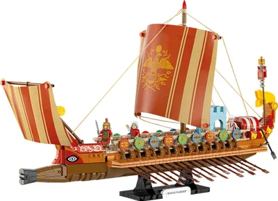 A detailed model of a Roman warship on a black display stand against a white background.