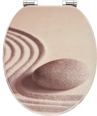 A toilet seat lid with a zen garden design.