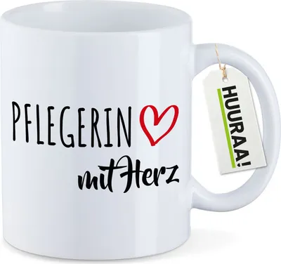 Produktbild von Huuraa Kaffeetasse Pflegerin mit Herz 330ml Weiß Keramik Kaffeebecher Geschenkidee