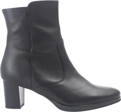 A black leather boot on a white background.