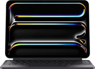 A tablet with a keyboard attachment, displaying a colorful abstract wallpaper.