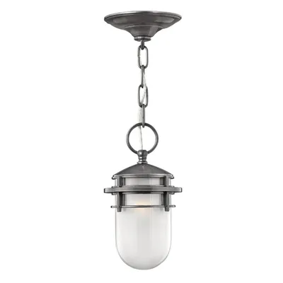 A hanging outdoor light fixture with a glass shade.