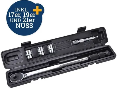 A torque wrench and its accessories are neatly arranged in a black plastic case against a white background. The case is open, revealing the tools inside.