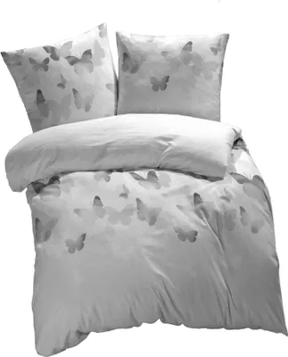A bedding set with a butterfly pattern.