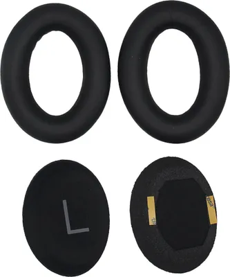 Four black ear pads for headphones, arranged in a two-by-two grid.