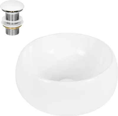 A white ceramic basin and a drain assembly are shown against a white background.