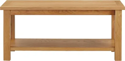 A front view of a wooden coffee table with a shelf.